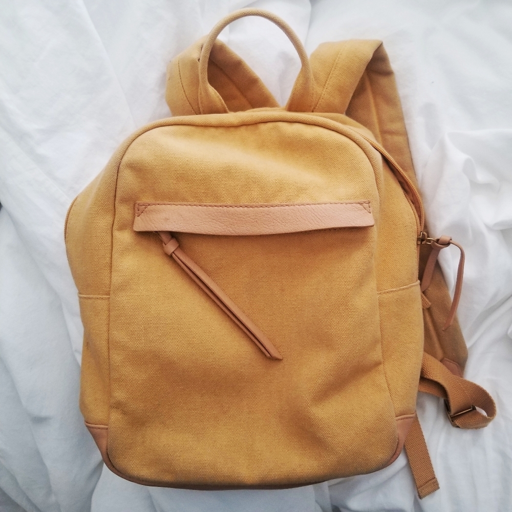 Mustard yellow canvas backpack
